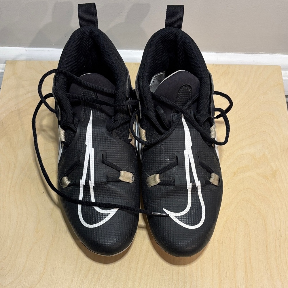 football cleats Nike Black and White Athletic Shoes